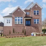 Stunning move-in-ready newly constructed home in the highly sought after Hart's Landmark community located a short distance from historic downtown Franklin. This home features 4 spacious bedrooms and 4 and a half beautifully designed bathrooms. Primary bedroom on the first level features soaring vaulted ceilings, an abundance of natural light, and leads to the polished en-suite with double vanities, spa-like shower and tub, and a substantial walk-in-closet. French doors leading into the study provide privacy while the unique accent wall elevates the space. Gourmet kitchen features custom cabinetry, an oversized island, upgraded appliances and leads to a large pantry. Just outside of the bright and airy living room is a covered back porch, perfect for easy living and entertaining.